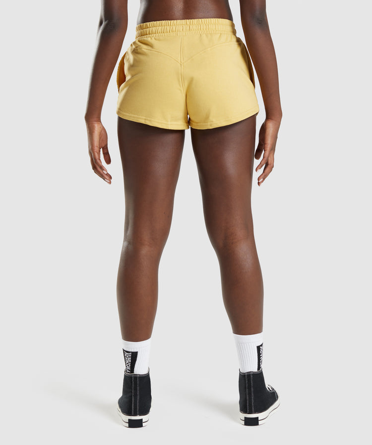 GYMSHARK LEGACY GRAPHIC LEMON YELLOW ŠORTAI