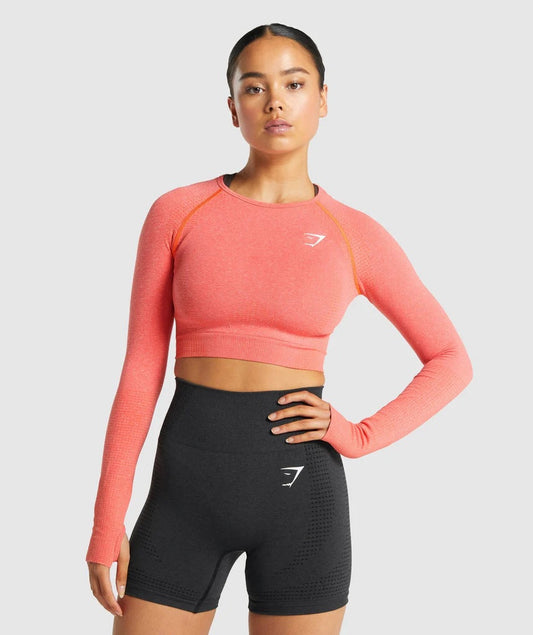 GYMSHARK VITAL SEAMLESS LONG SLEEVE CROP TOP ORANGE PINK MARL SPORTINĖ PALAIDINĖ