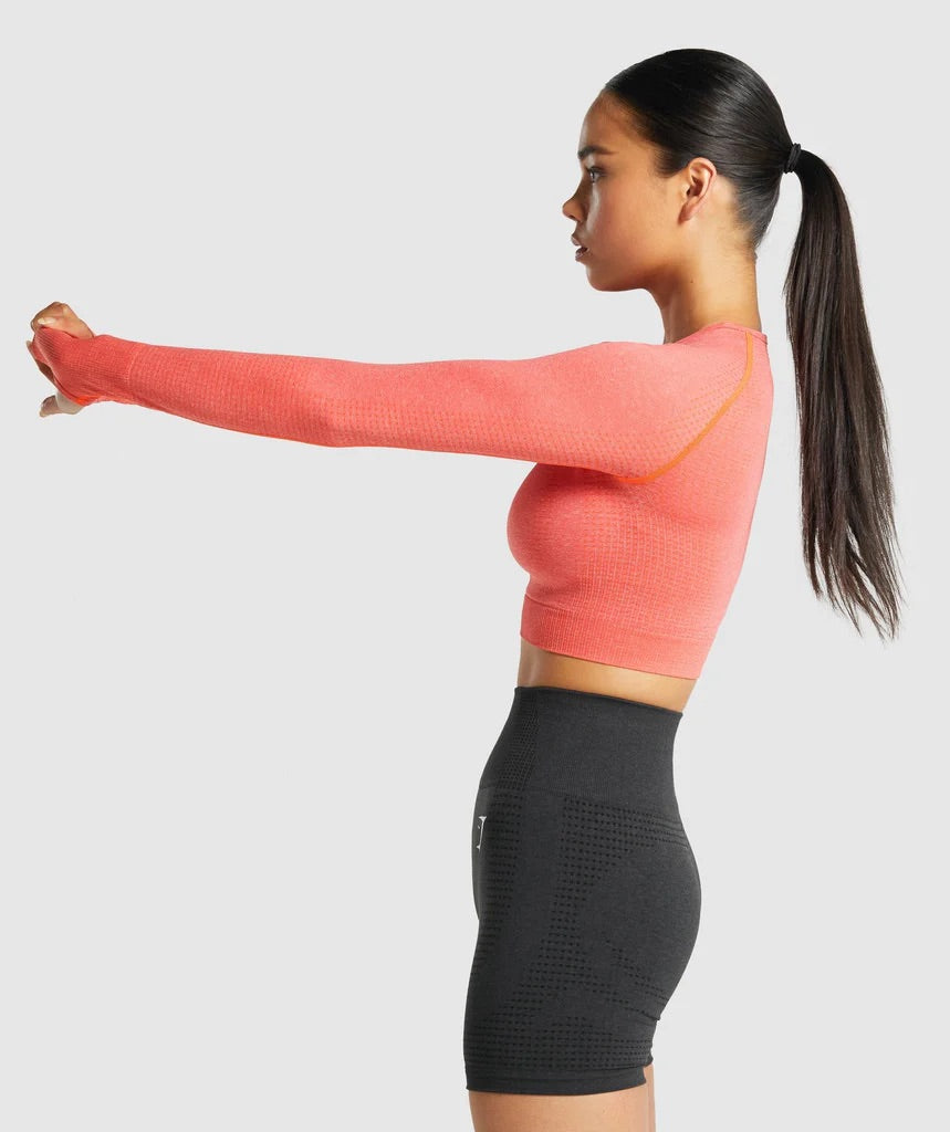 GYMSHARK VITAL SEAMLESS LONG SLEEVE CROP TOP ORANGE PINK MARL SPORTINĖ PALAIDINĖ