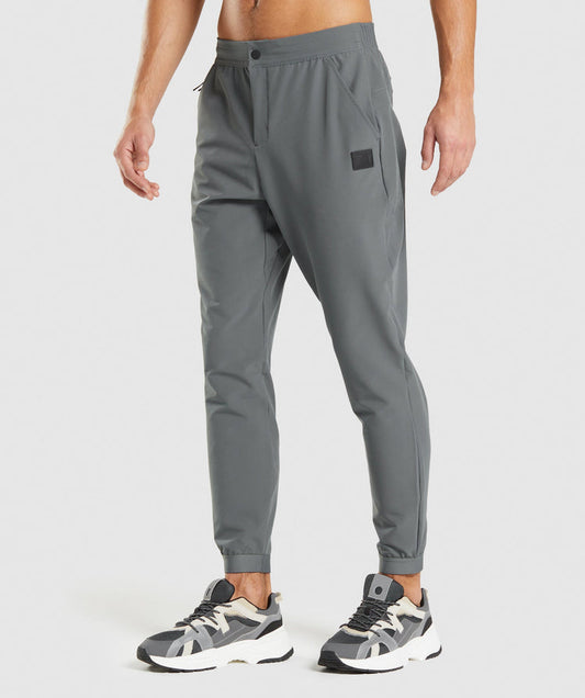 GYMSHARK RETAKE WOVEN DARK GREY KELNĖS