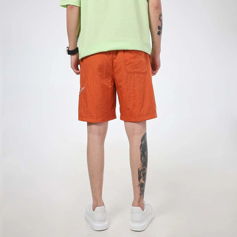 NIKE SPORTSWEAR ALUMNI ORANGE DB3810-812 ŠORTAI