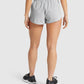 GYMSHARK TRAINING LOOSE FIT LIGHT GREY ŠORTAI