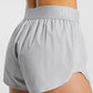 GYMSHARK TRAINING LOOSE FIT LIGHT GREY ŠORTAI