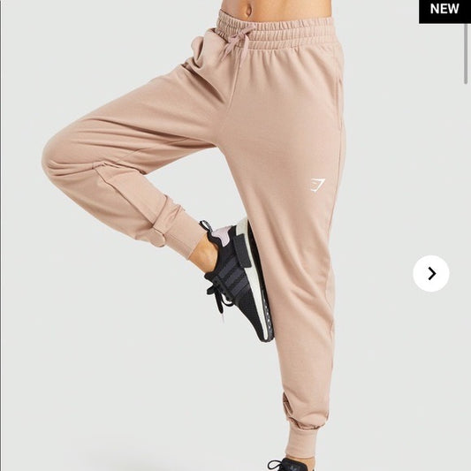 GYMSHARK TRAINING JOGGERS LIGHT PINK KELNĖS