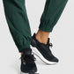 GYMSHARK TRAINING WOVEN DARK GREEN KELNĖS