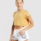 GYMSHARK LEGACY GRAPHIC CROP TEE YELLOW MARŠKINĖLIAI