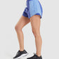 GYMSHARK PULSE 2-1 BLUE MIXED ŠORTAI