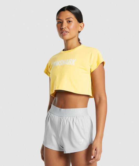 GYMSHARK ANIMAL GRAPHIC INFILL CROP TEE YELLOW SPORTINĖ PALAIDINĖ