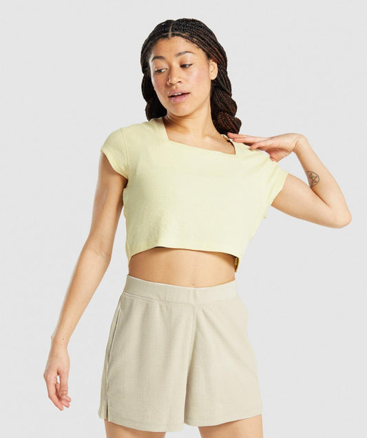 GYMSHARK PAUSE CROP TOP LIGHT YELLOW SPORTINĖ PALAIDINĖ