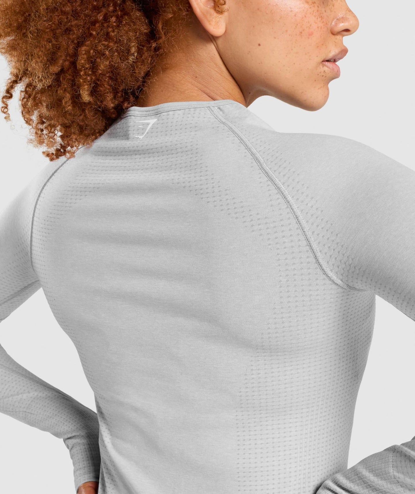 GYMSHARK VITAL SEAMLESS 2.0 LONG SLEEVE TOP LIGHT GREY SPORTINĖ PALAIDINĖ