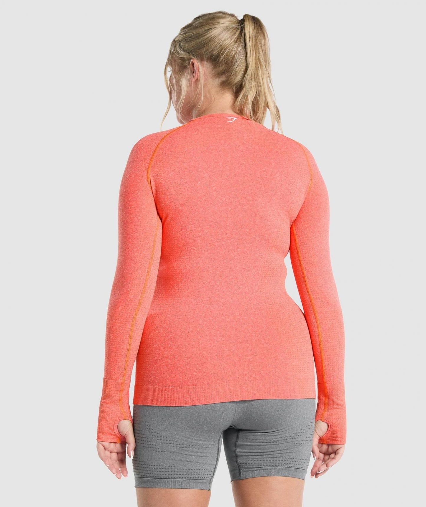 GYMSHARK VITAL SEAMLESS LONG SLEEVE TOP ORANGE MARL SPORTINĖ PALAIDINĖ